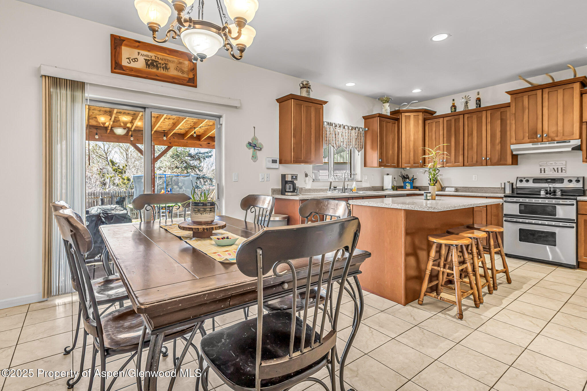 1357 West Spruce Court Rifle, CO 81650 - Photo 7 of 38 a view of a dining room with furniture window and outside view