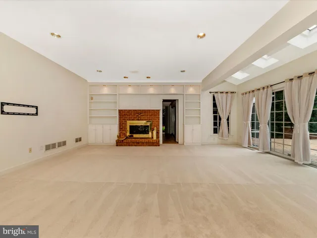a kitchen with stainless steel appliances a sink and a cabinets
