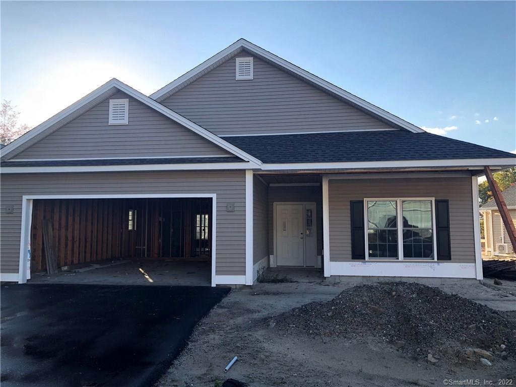 7 Grouse Court, Unit 7 Killingly, CT 06239 - Photo 1 of 1 a front view of a house