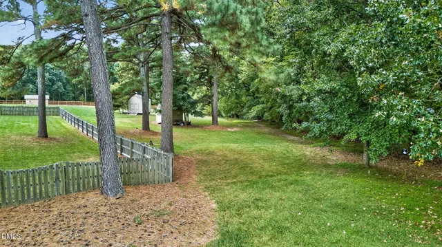 a view of a golf course with a garden