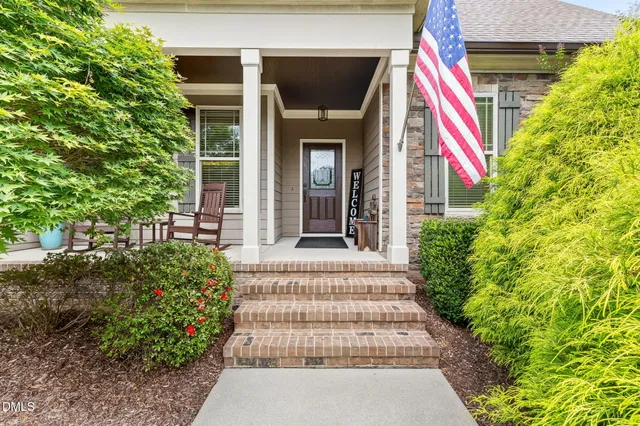 a front view of a house with a porch
