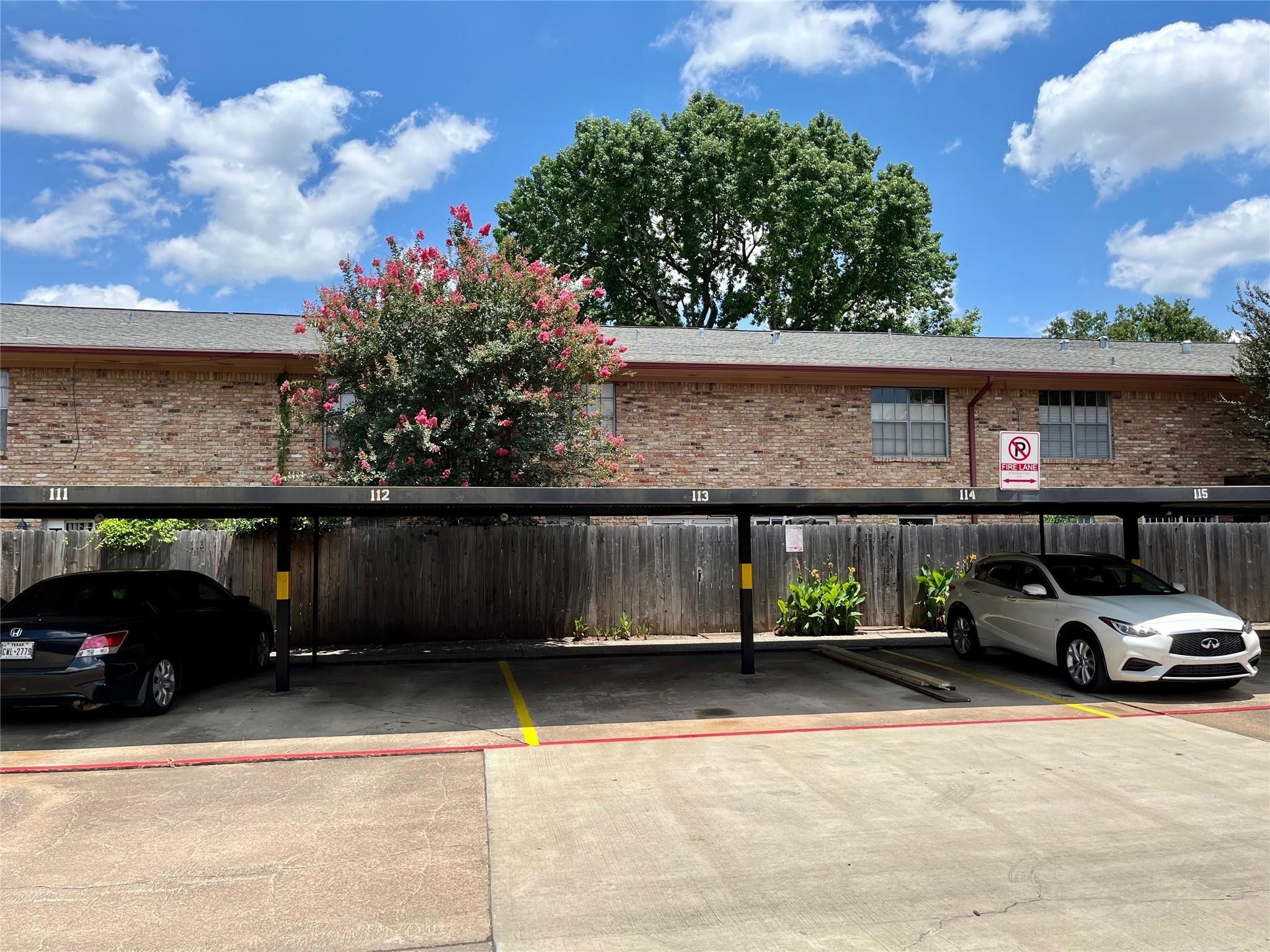 7600 Burgoyne Road, Unit 115 Houston, TX 77063 - Photo 13 of 14 a view of street with parked cars