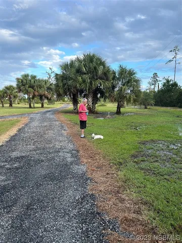 a view of a lake with a building in front of it