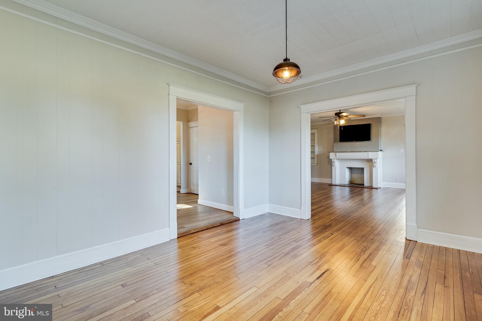 28055 Old Village Road Mechanicsville, MD 20659 - Photo 22 of 56 a view of a room with wooden floor and a window
