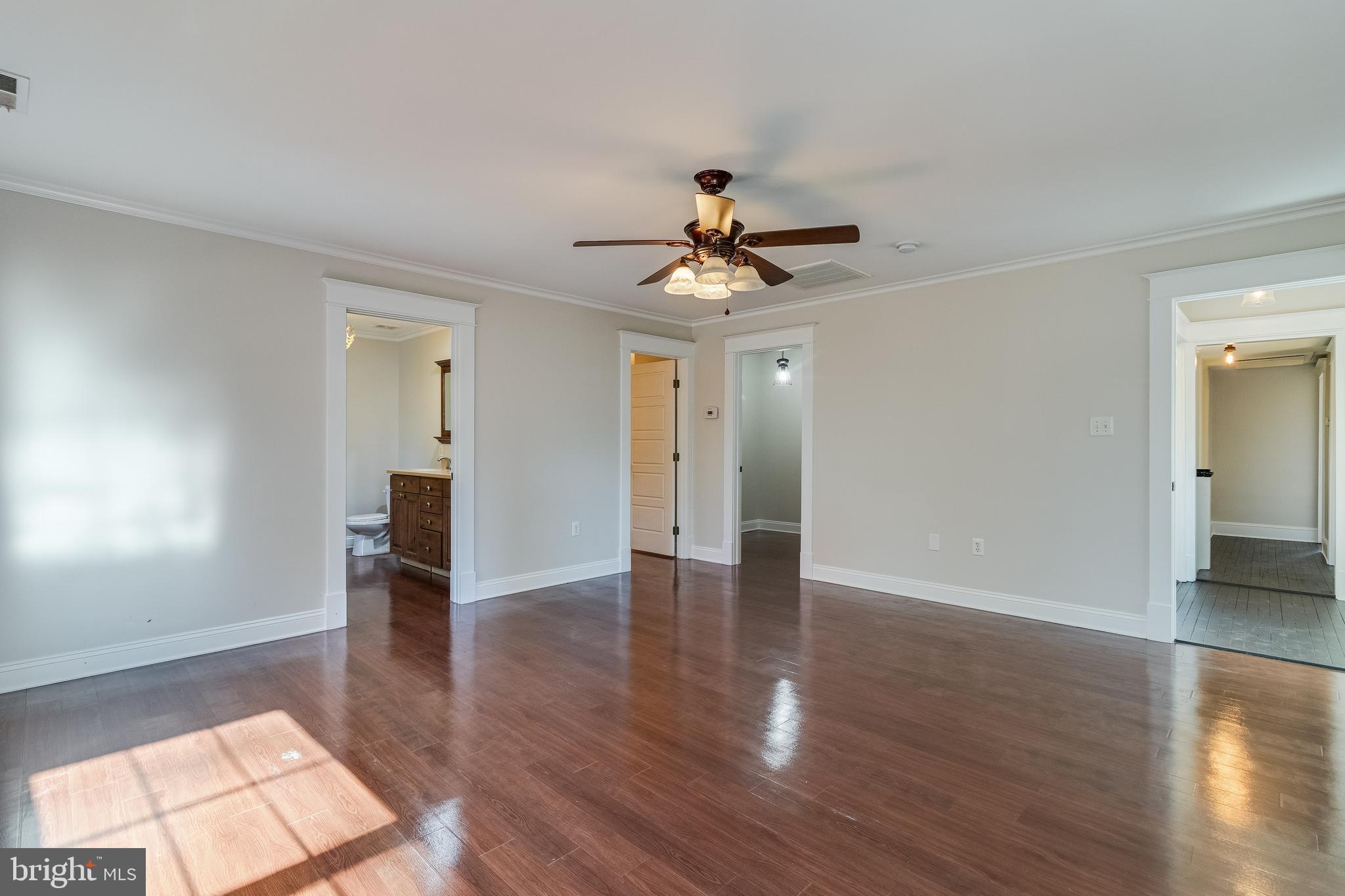 28055 Old Village Road Mechanicsville, MD 20659 - Photo 30 of 56 a view of an empty room with window and wooden floor