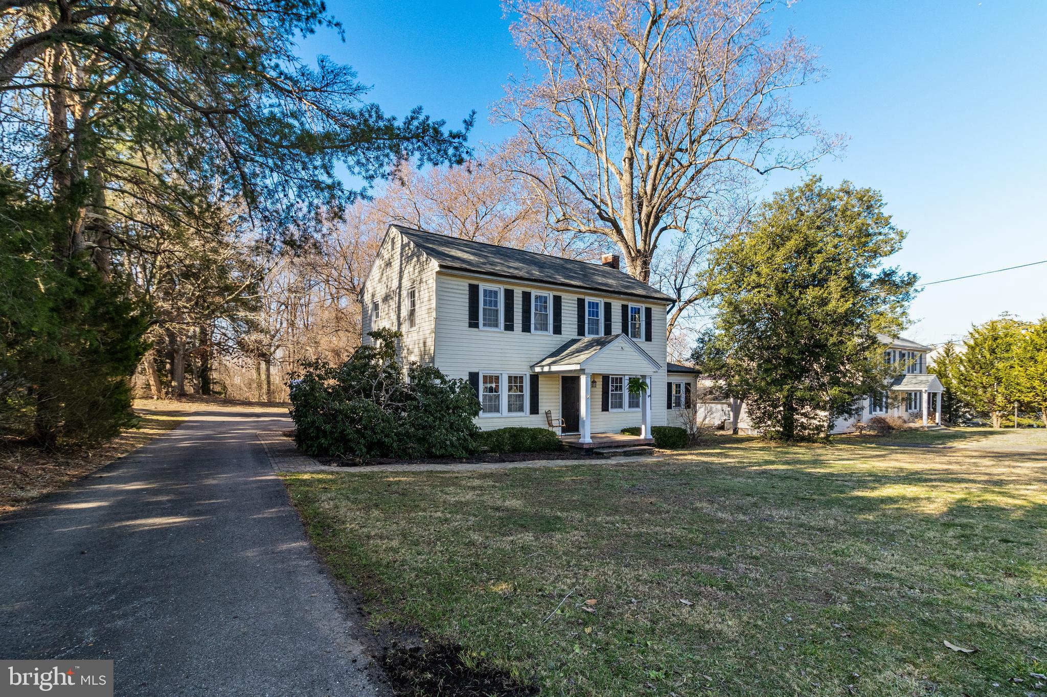 28055 Old Village Road Mechanicsville, MD 20659 - Photo 53 of 56 a front view of a house with a garden