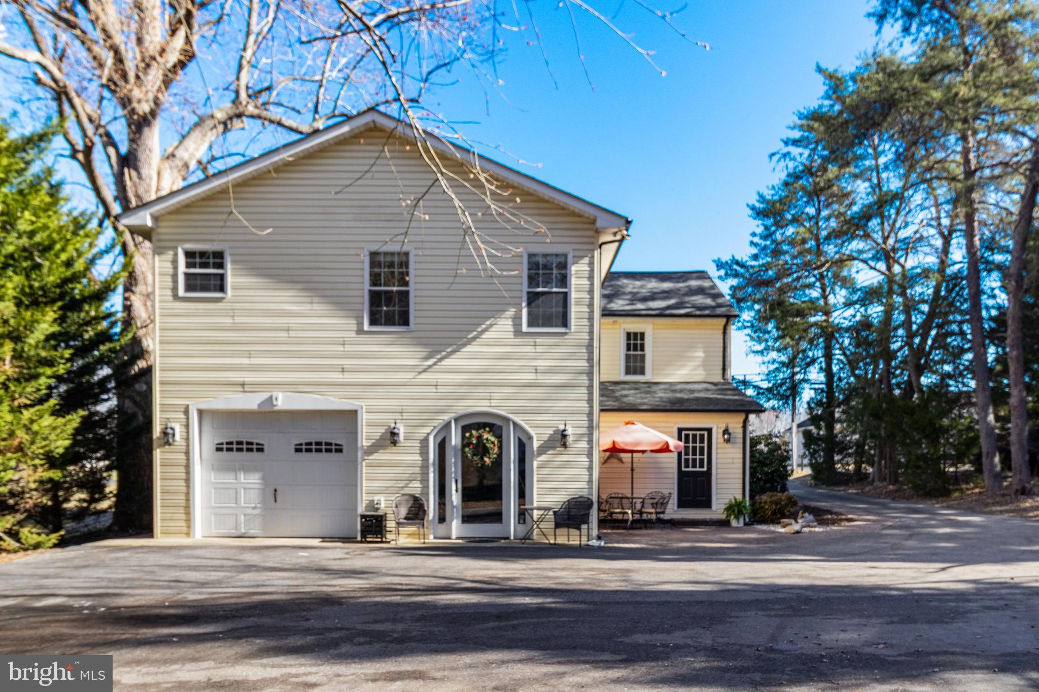 28055 Old Village Road Mechanicsville, MD 20659 - Photo 55 of 56 a front view of a house with a balcony