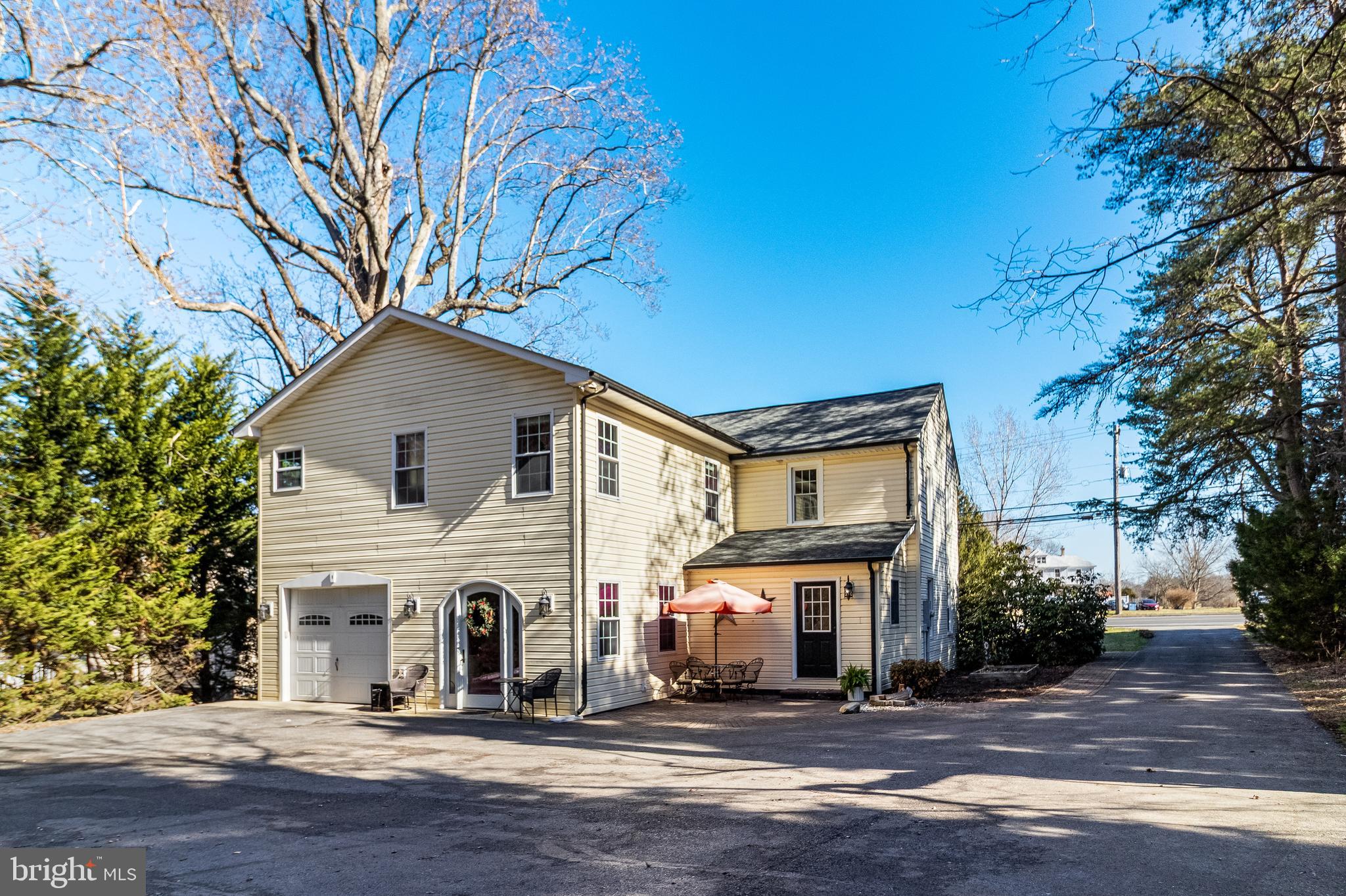 28055 Old Village Road Mechanicsville, MD 20659 - Photo 56 of 56 a front view of a house with a yard