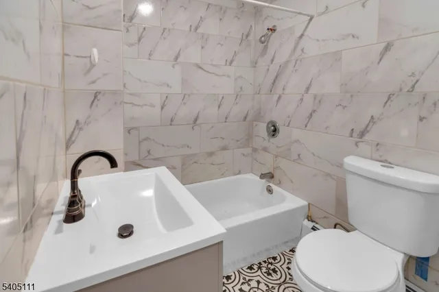 a bathroom with a sink and a toilet