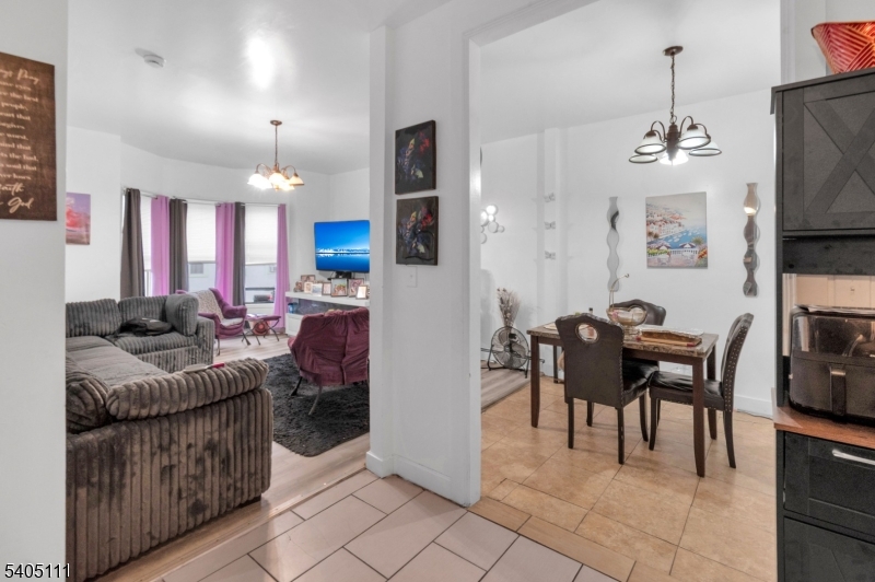 25 Oak Street, Unit 25 Paterson, NJ 07501 - Photo 6 of 25 a view of a dining room with furniture