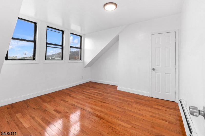 25 Oak Street, Unit 25 Paterson, NJ 07501 - Photo 10 of 25 an empty room with window