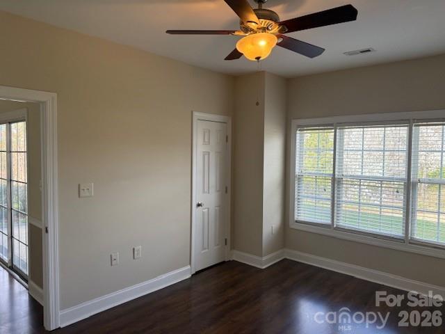 8913 Meadow Vista Road Charlotte, NC 28213 - Photo 18 of 30 a view of an empty room with wooden floor and a window