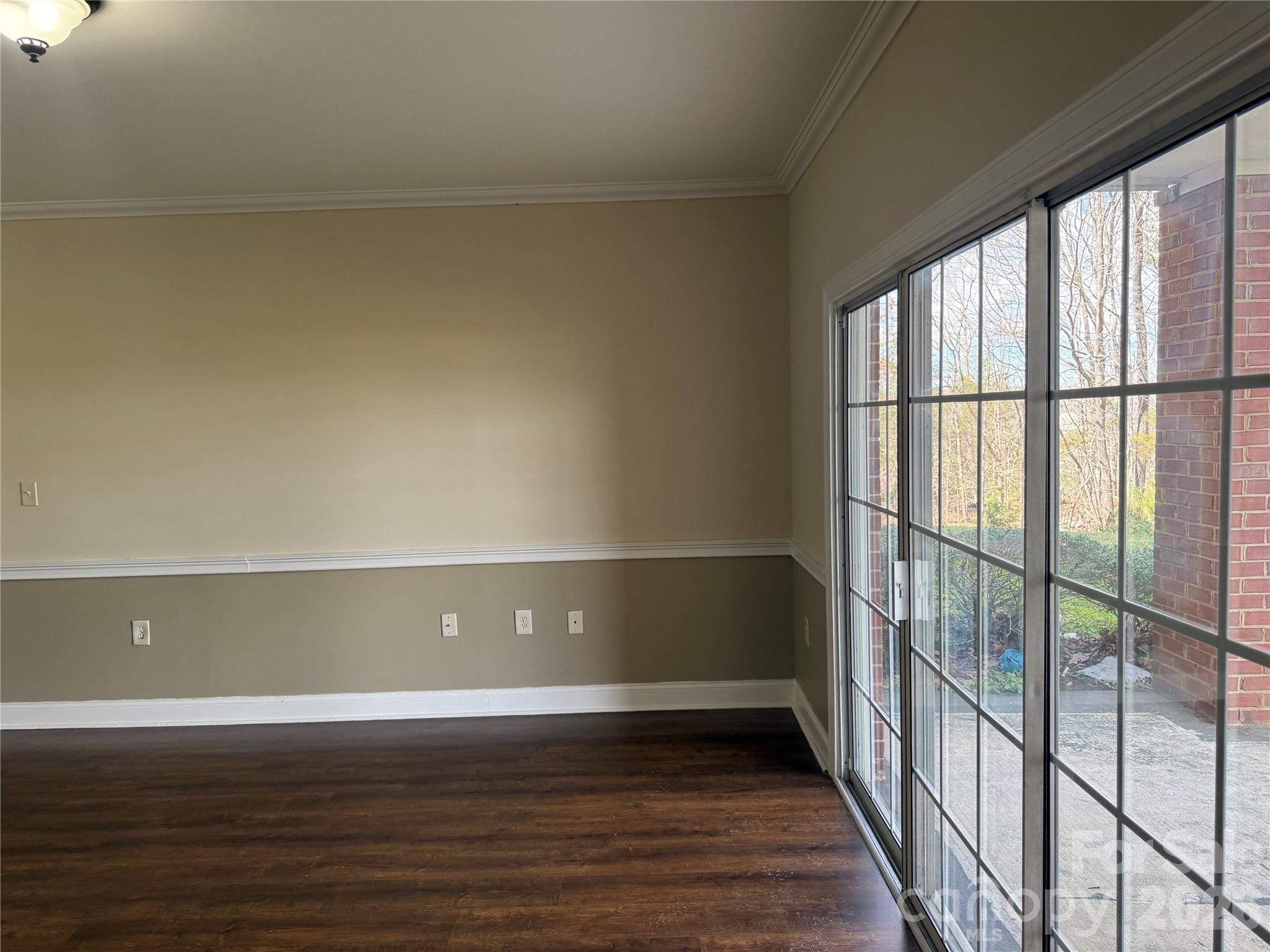 8913 Meadow Vista Road Charlotte, NC 28213 - Photo 26 of 30 a view of room with wooden floor and fan