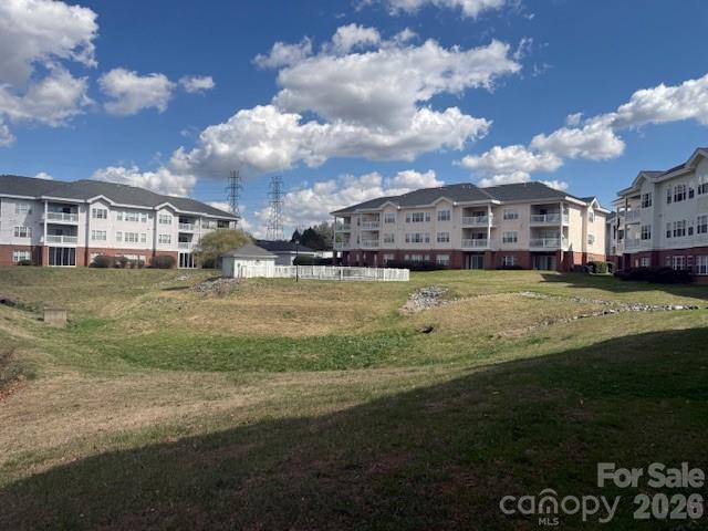 8913 Meadow Vista Road Charlotte, NC 28213 - Photo 30 of 30 a view of a big yard next to a building