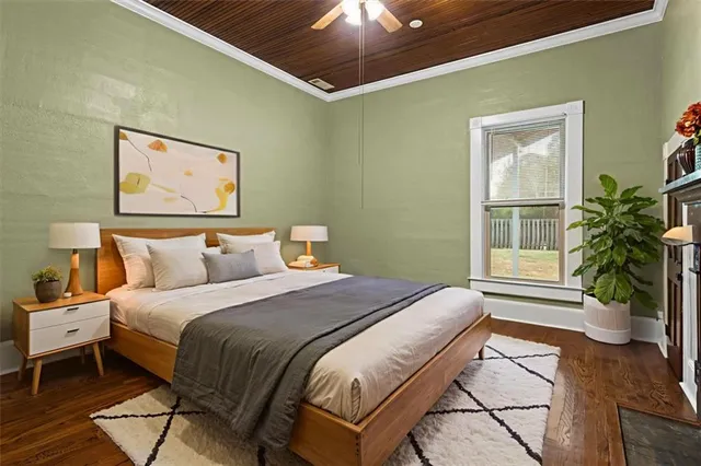 a bedroom with bed and a window