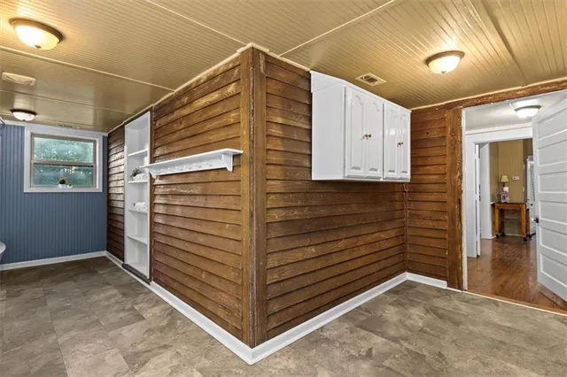 a view of a bathroom from a hallway