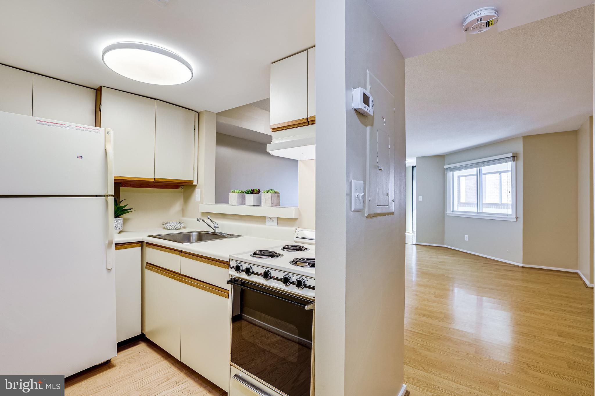 1951 Sagewood Lane, Unit 517 Reston, VA 20191 - Photo 22 of 50 The kitchen has hardwood floors.