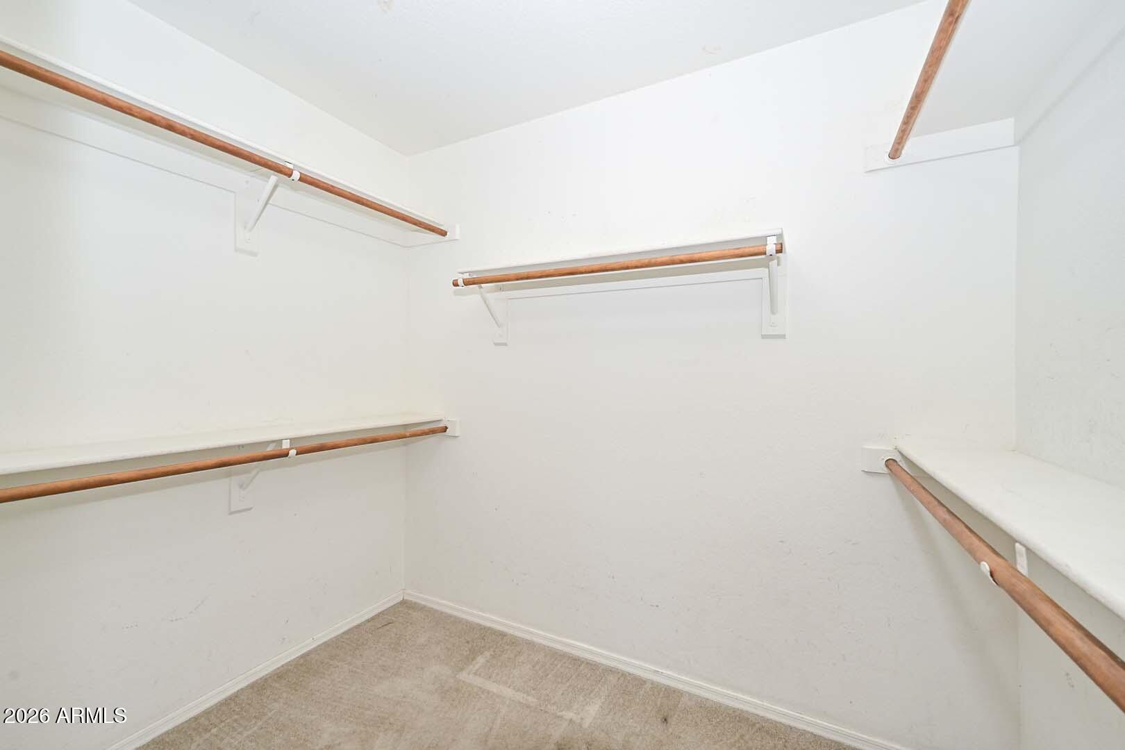 13349 West Boca Raton Road Surprise, AZ 85379 - Photo 25 of 43 Primary Walk-in-Closet
