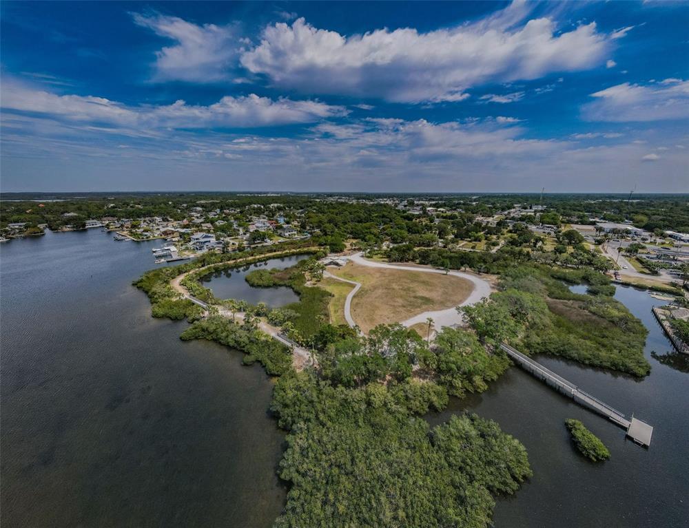 5433 Bluepoint Drive Port Richey, FL 34668 - Photo 38 of 50 a view of a lake