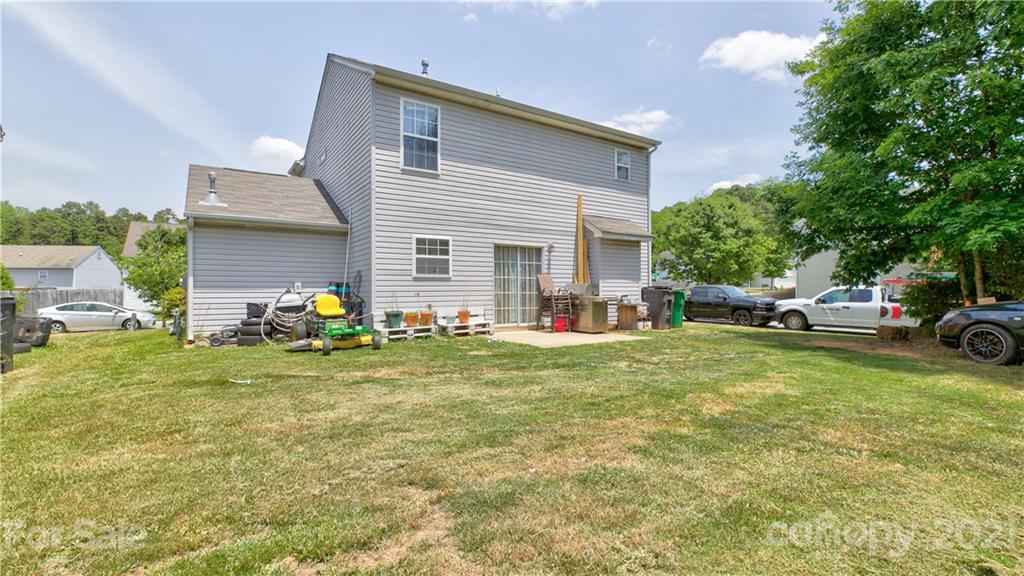 7103 Indian Ridge Lane Charlotte, NC 28214 - Photo 24 of 24 a view of a house with backyard
