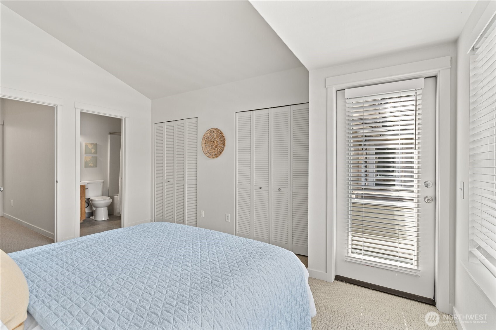 10311 Midvale Avenue North, Unit A Seattle, WA 98133 - Photo 12 of 19 a bedroom with a bed and a window