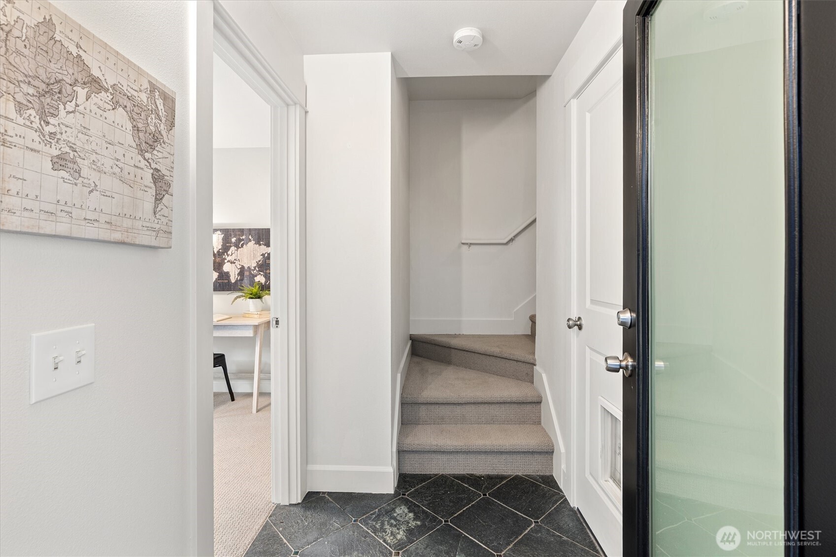 10311 Midvale Avenue North, Unit A Seattle, WA 98133 - Photo 15 of 19 a view of a hallway with wooden floor and entryway