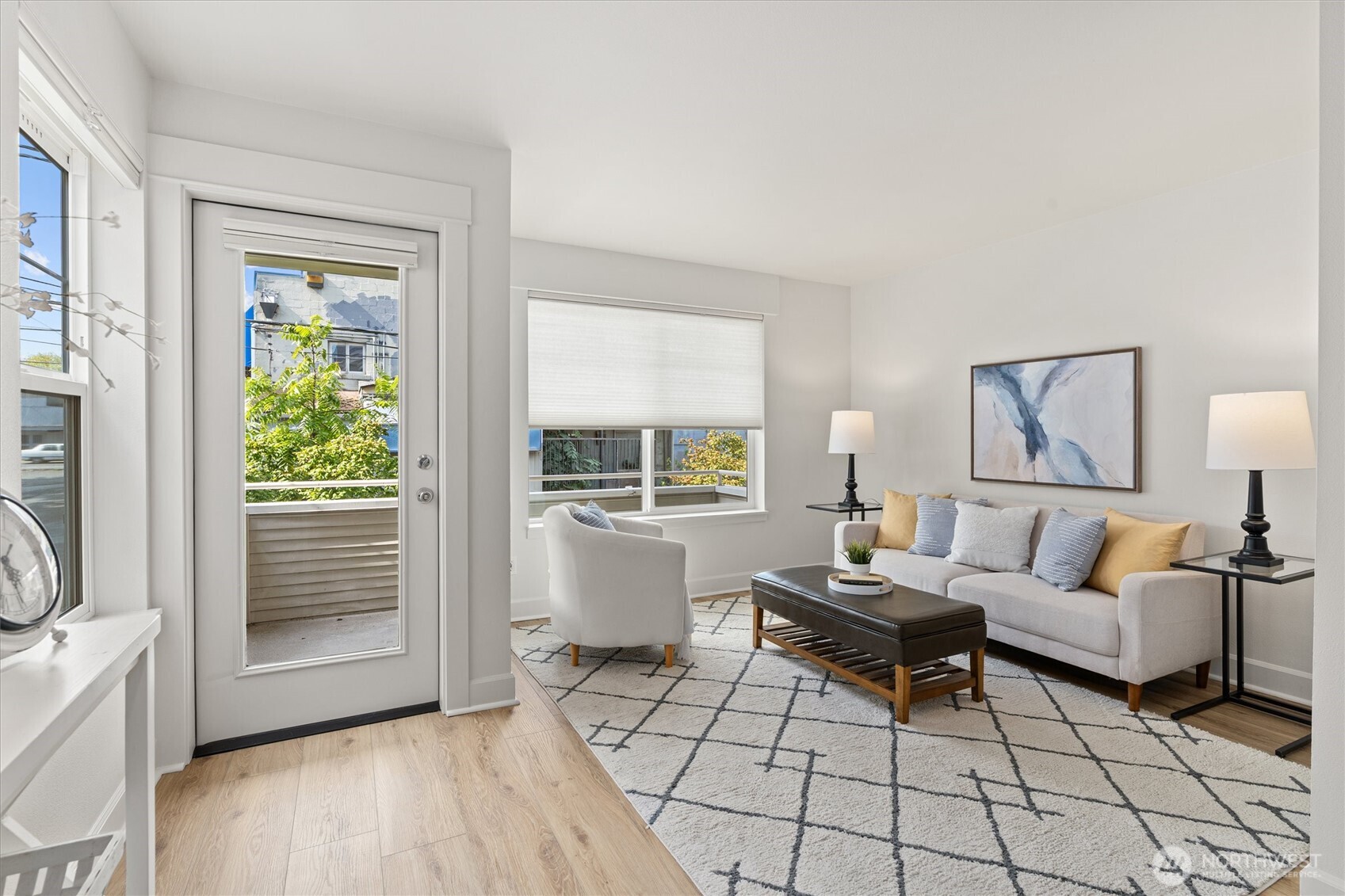 10311 Midvale Avenue North, Unit A Seattle, WA 98133 - Photo 2 of 19 a living room with furniture and a window