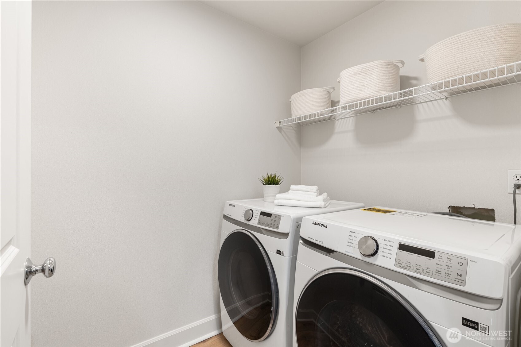 10311 Midvale Avenue North, Unit A Seattle, WA 98133 - Photo 7 of 19 a utility room with dryer and washer