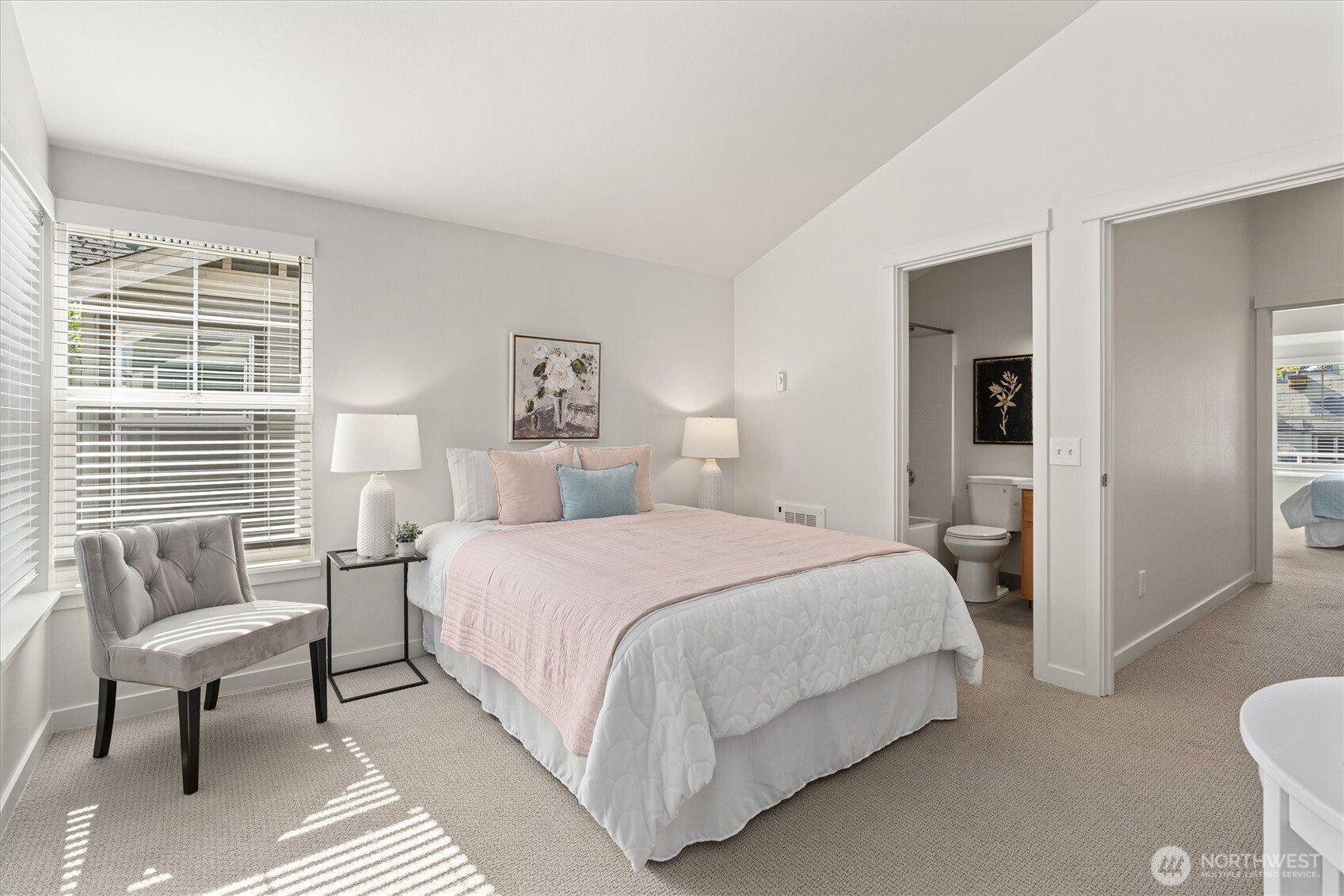 10311 Midvale Avenue North, Unit A Seattle, WA 98133 - Photo 9 of 19 a bedroom with a bed and a couch