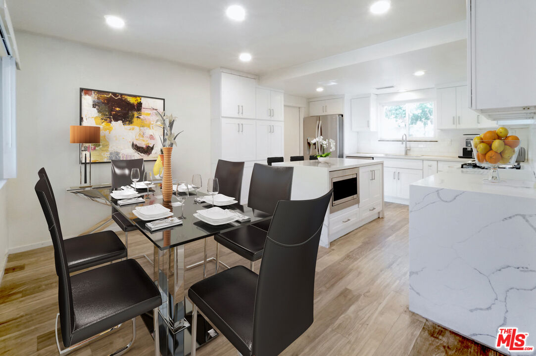 8251 Acacia Street Cypress, CA 90630 - Photo 2 of 13 a view of a dining room with furniture