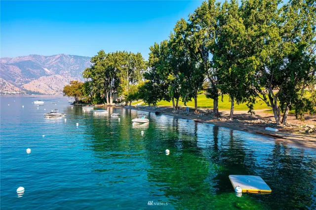 a view of a lake with a yard