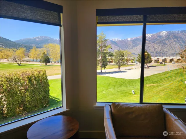 a view of a two room with a big yard