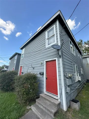 a front view of a house with yard
