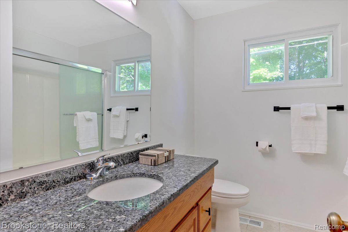 3265 Baldwin Road Metamora, MI 48455 - Photo 21 of 46 Granite counters continue in full bath