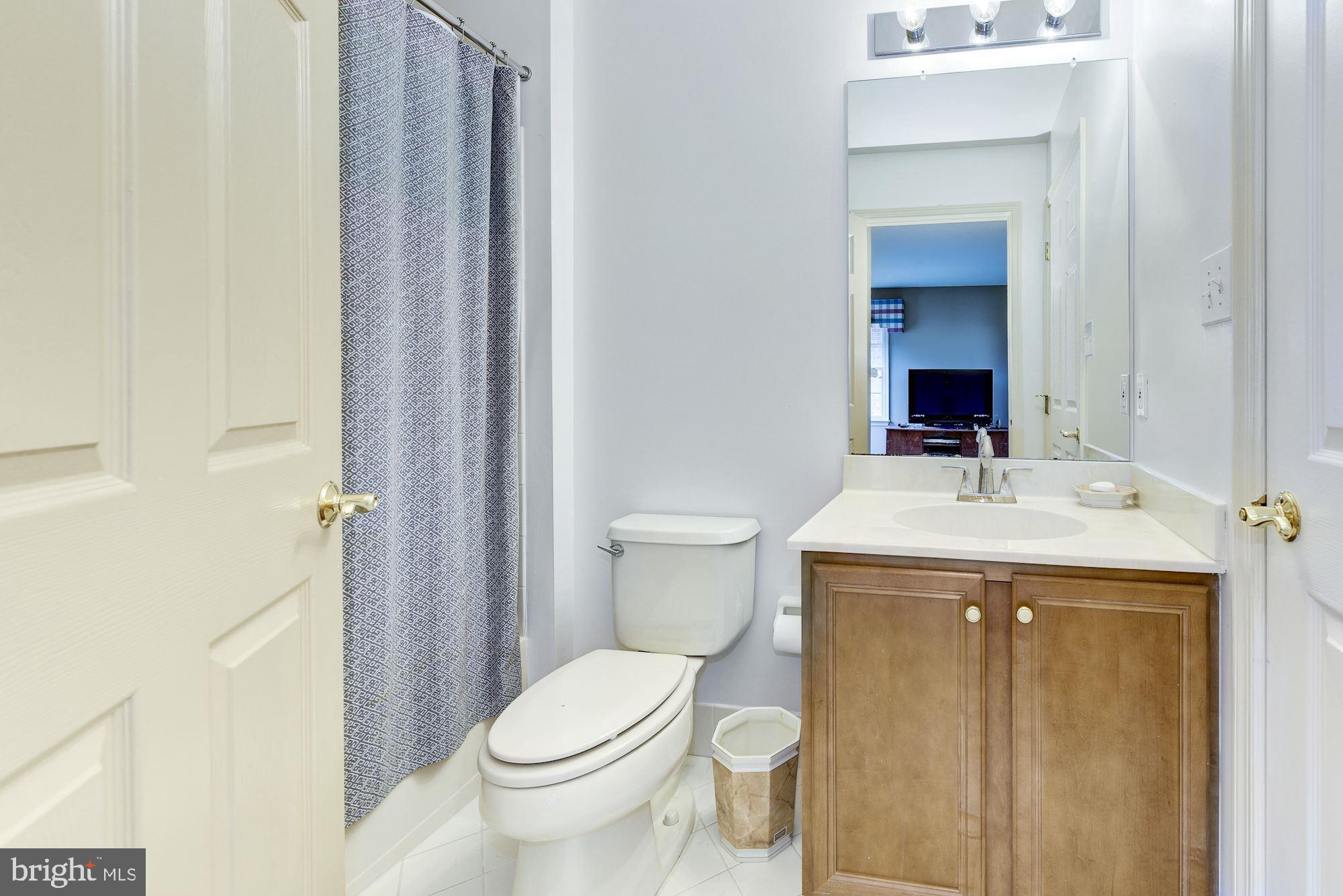126 Augusta Drive Moorestown, NJ 08057 - Photo 16 of 33 a bathroom with a sink and a toilet