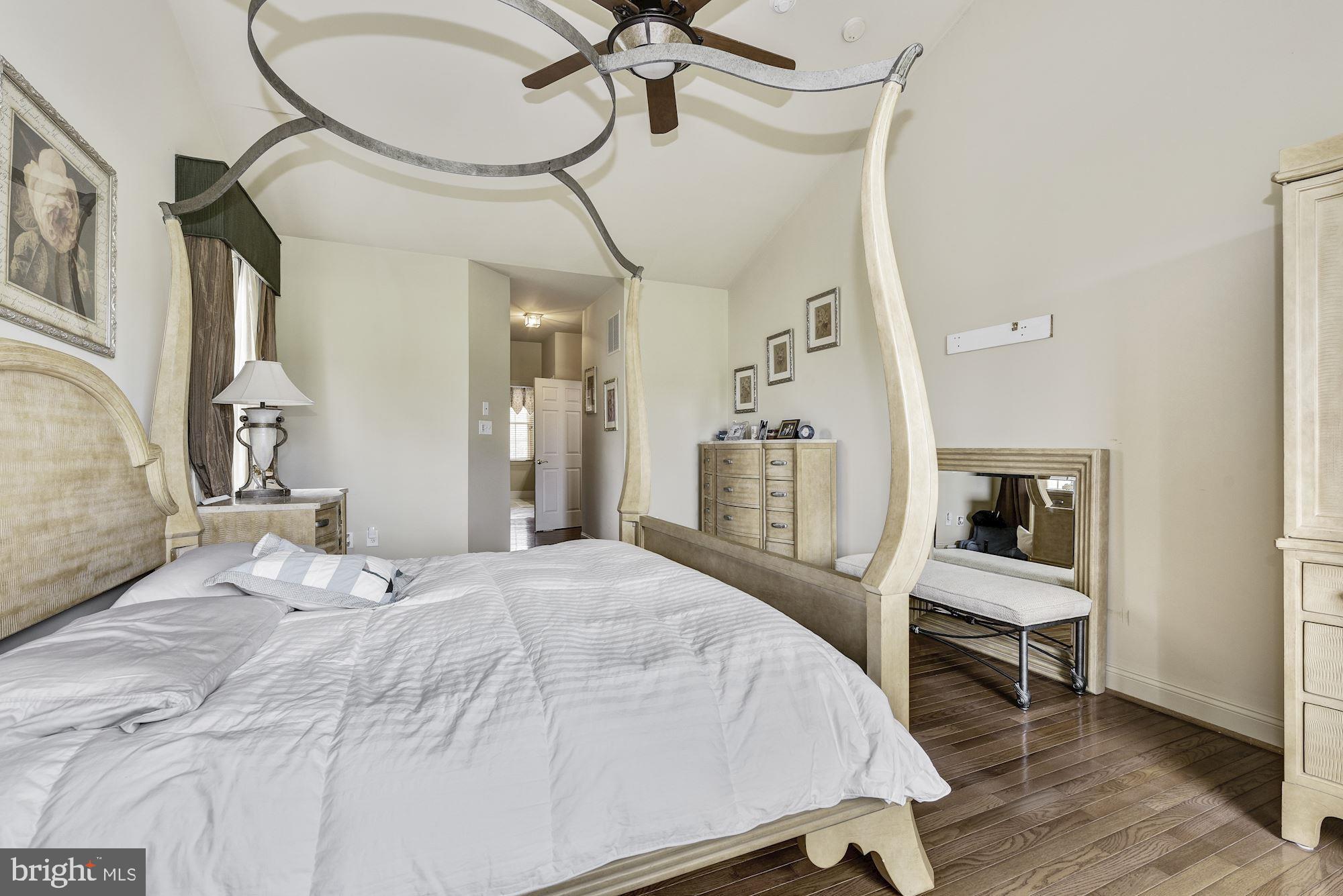 126 Augusta Drive Moorestown, NJ 08057 - Photo 19 of 33 a bed room with a bed and a mirror