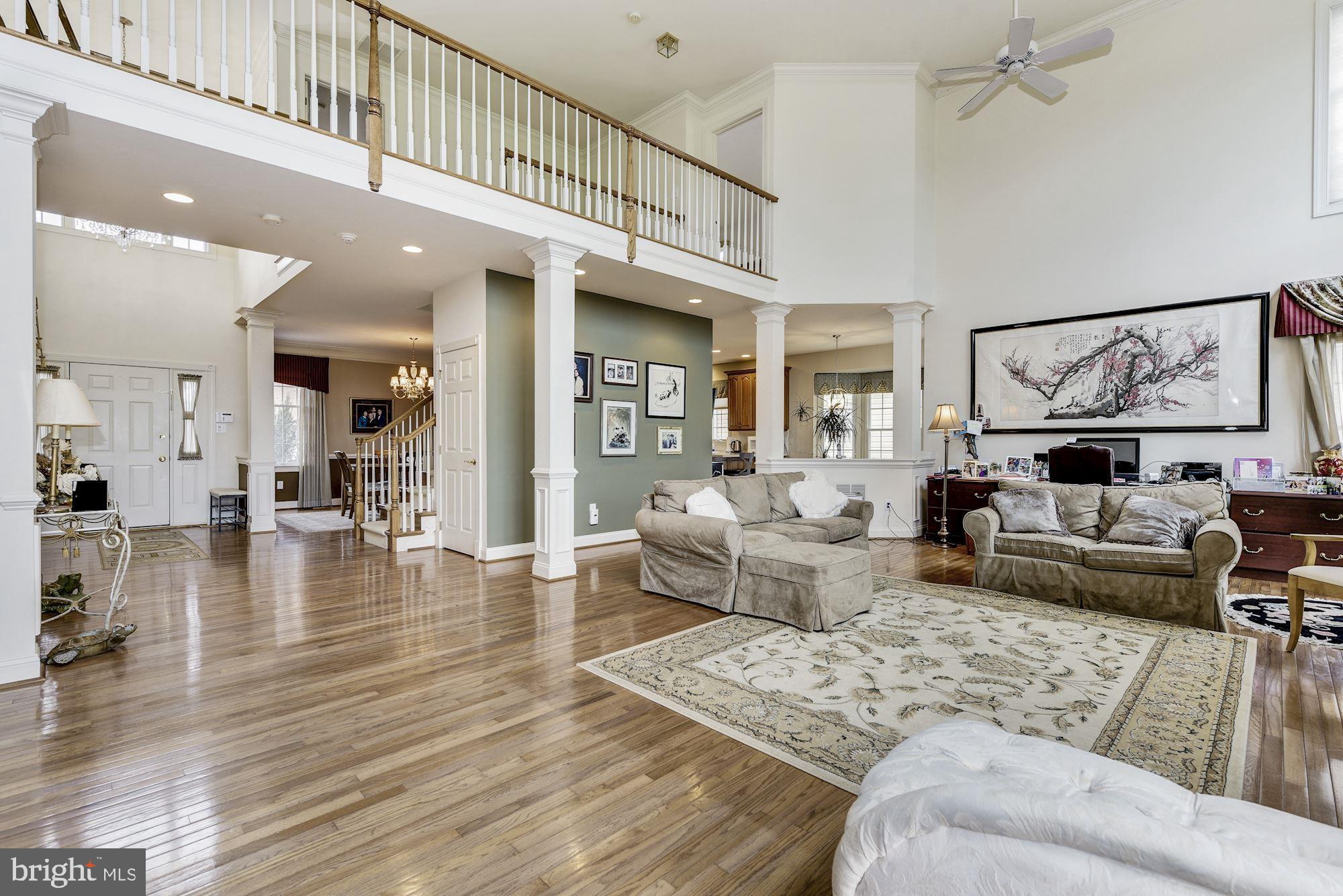 126 Augusta Drive Moorestown, NJ 08057 - Photo 3 of 33 a living room with furniture and a view of kitchen