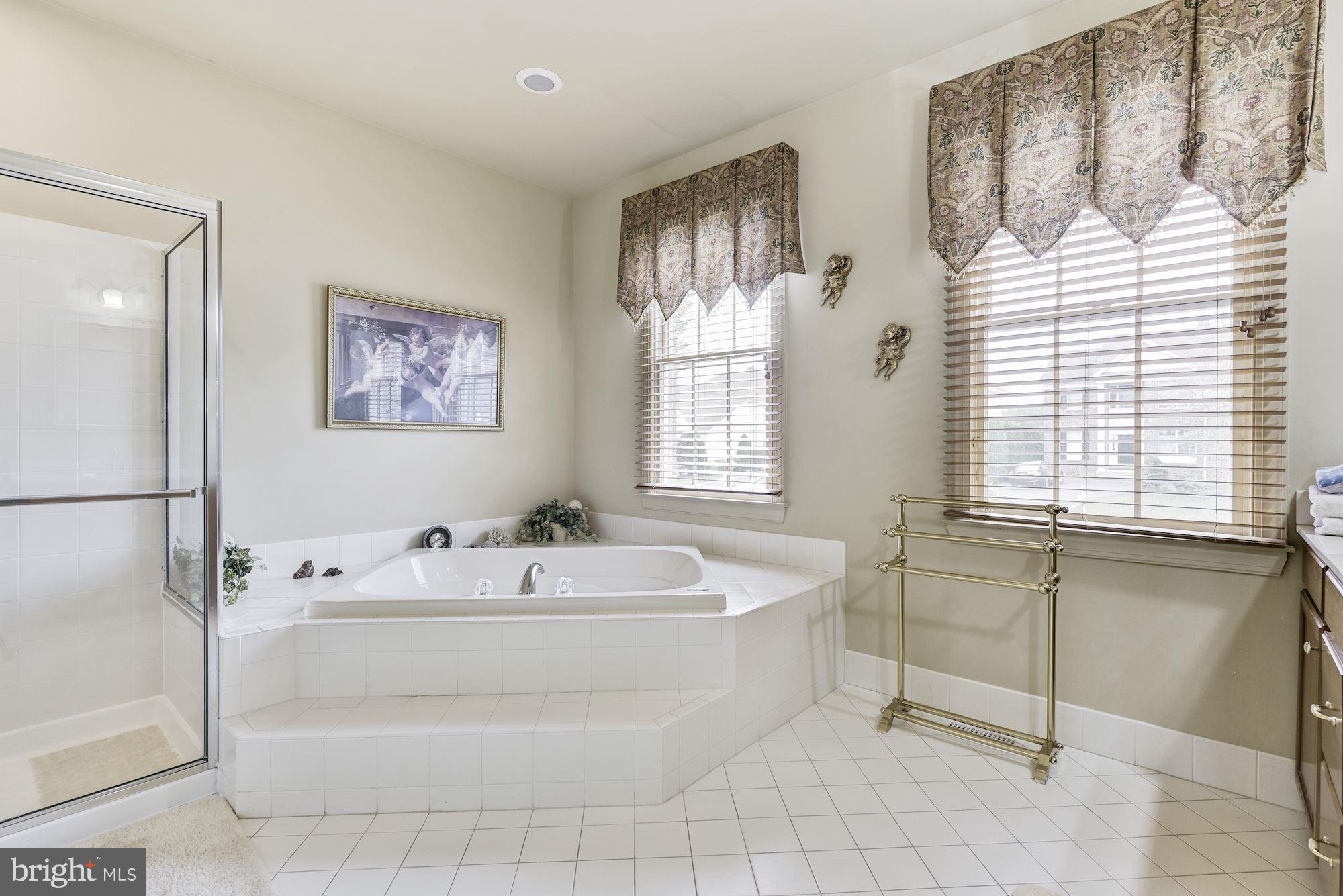 126 Augusta Drive Moorestown, NJ 08057 - Photo 21 of 33 a spacious bathroom with sink and mirror