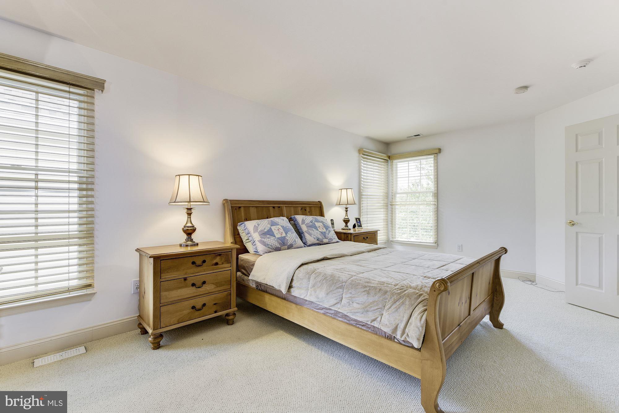 126 Augusta Drive Moorestown, NJ 08057 - Photo 23 of 33 a bedroom with a bed dresser and a window