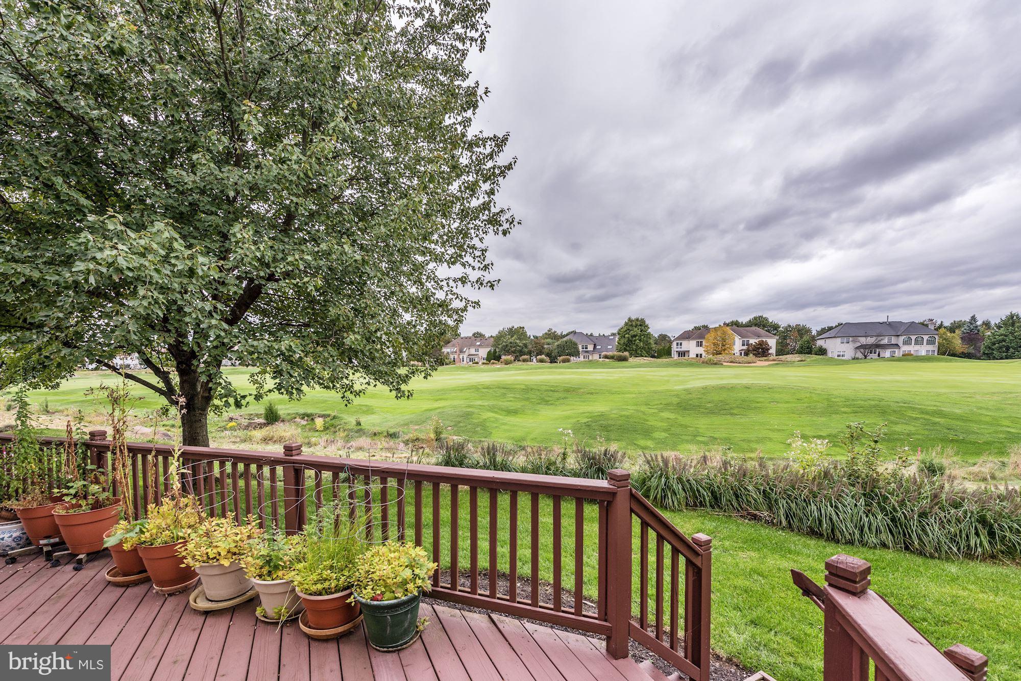 126 Augusta Drive Moorestown, NJ 08057 - Photo 31 of 33 a view of a deck with furniture and garden