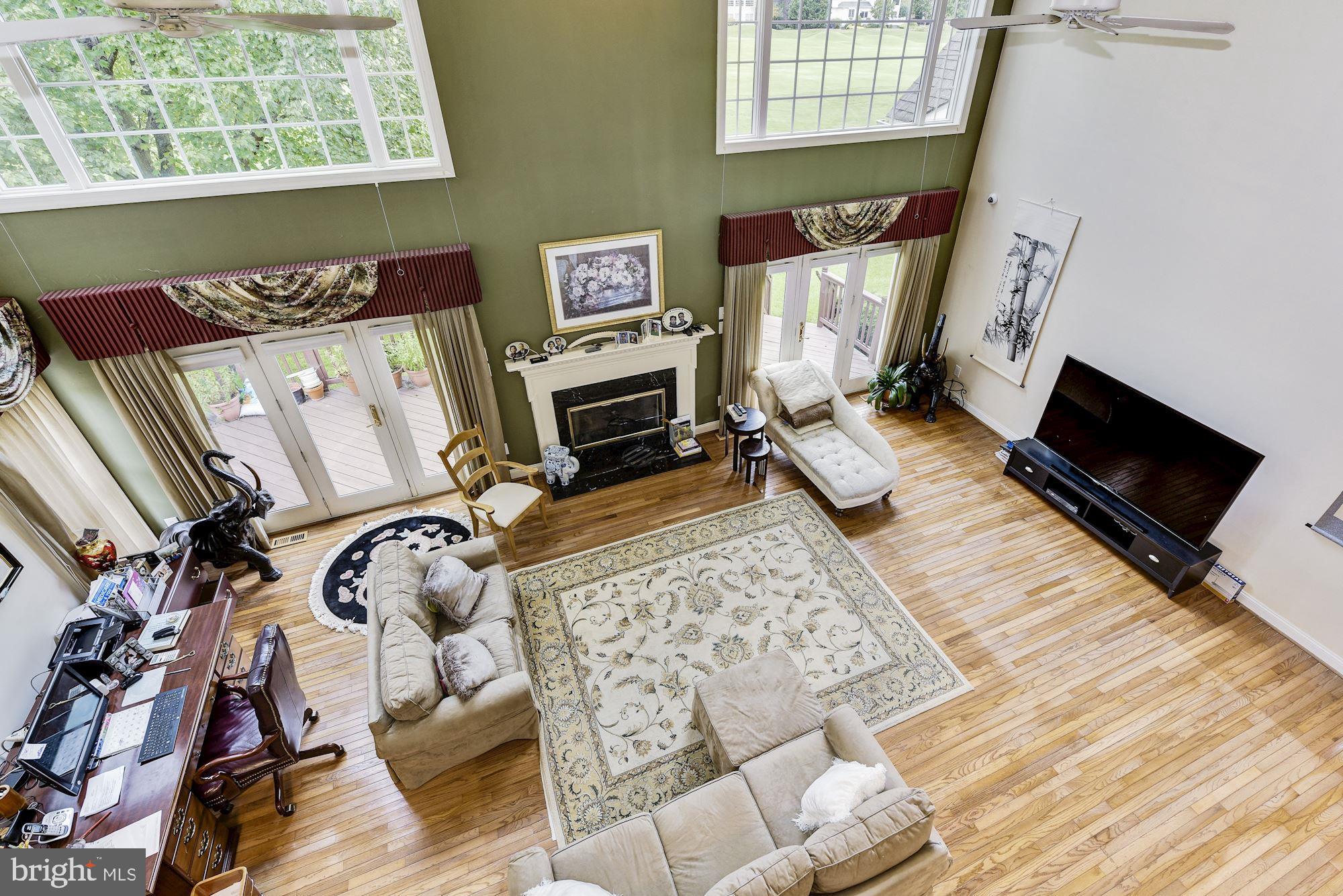126 Augusta Drive Moorestown, NJ 08057 - Photo 7 of 33 view of living room with furniture and a fireplace