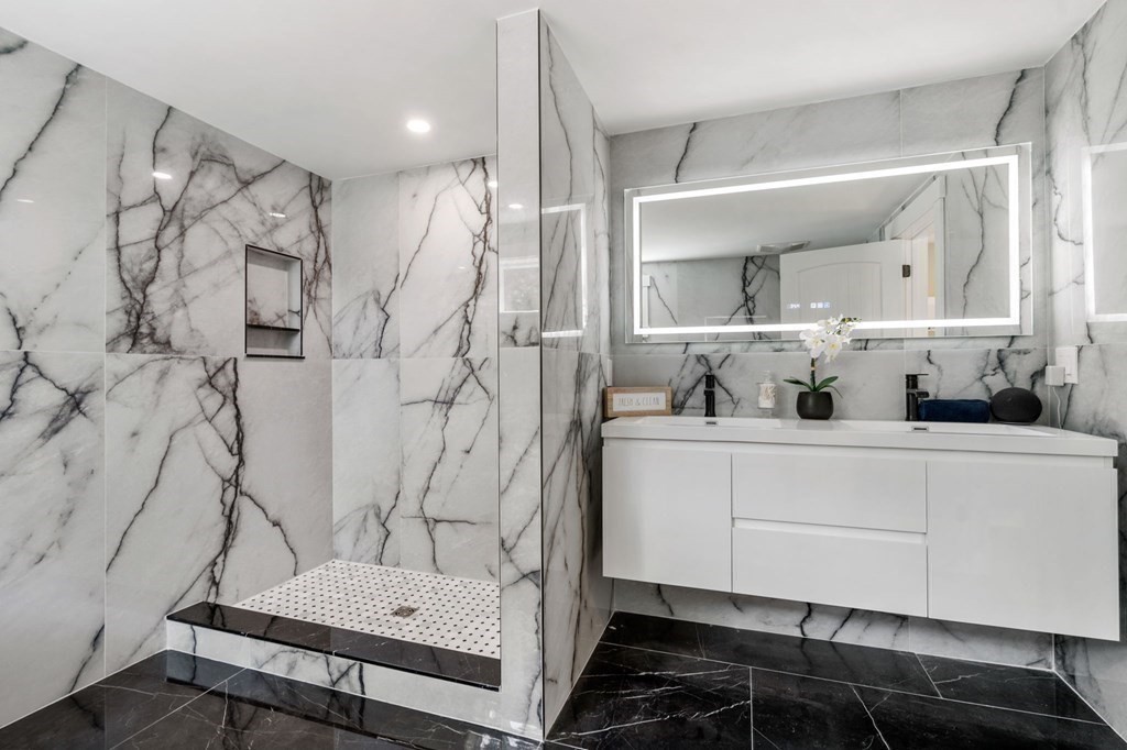 35 Longmeadow Road Medfield, MA 02052 - Photo 19 of 41 a bathroom with a bathtub and a shower