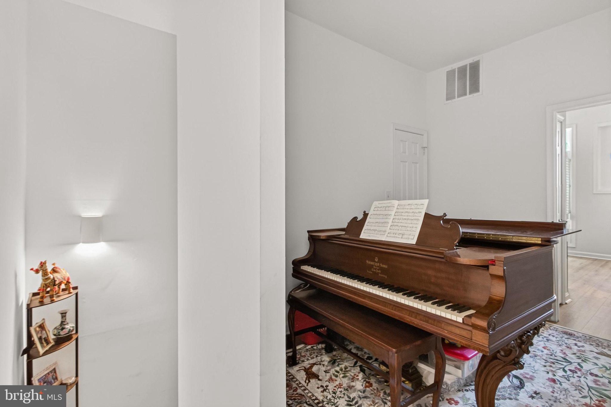 738 11th Street Northeast, Unit 1 Washington, DC 20002 - Photo 14 of 21 Elegant corner with a grand piano.