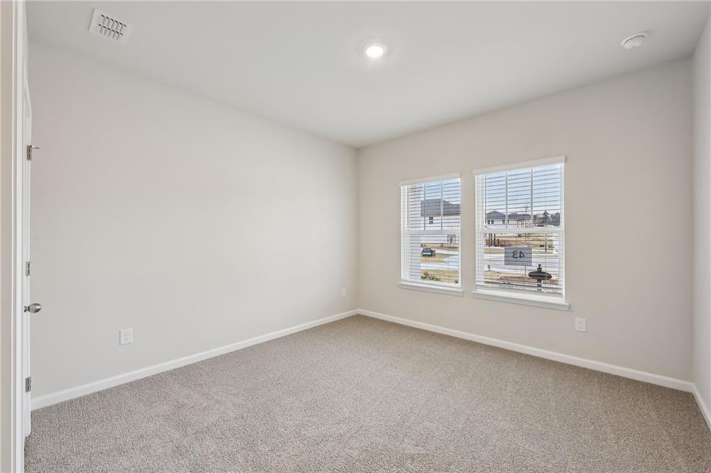 471 Tallulah Lane Grayson, GA 30017 - Photo 13 of 38 an empty room with a window