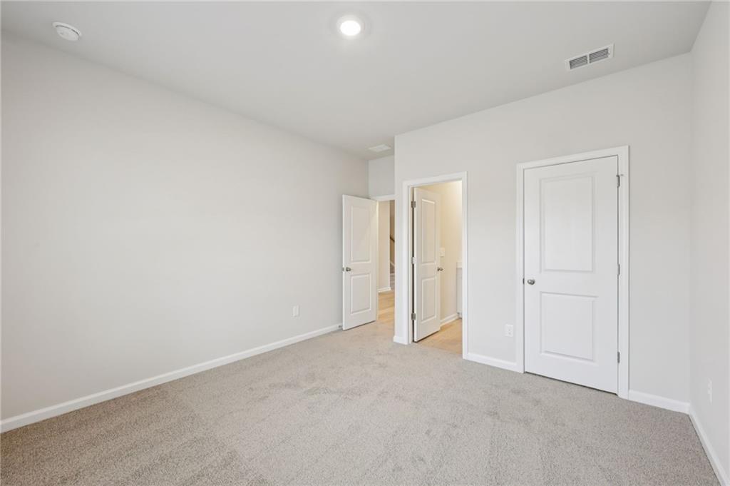 471 Tallulah Lane Grayson, GA 30017 - Photo 14 of 38 a view of an empty room
