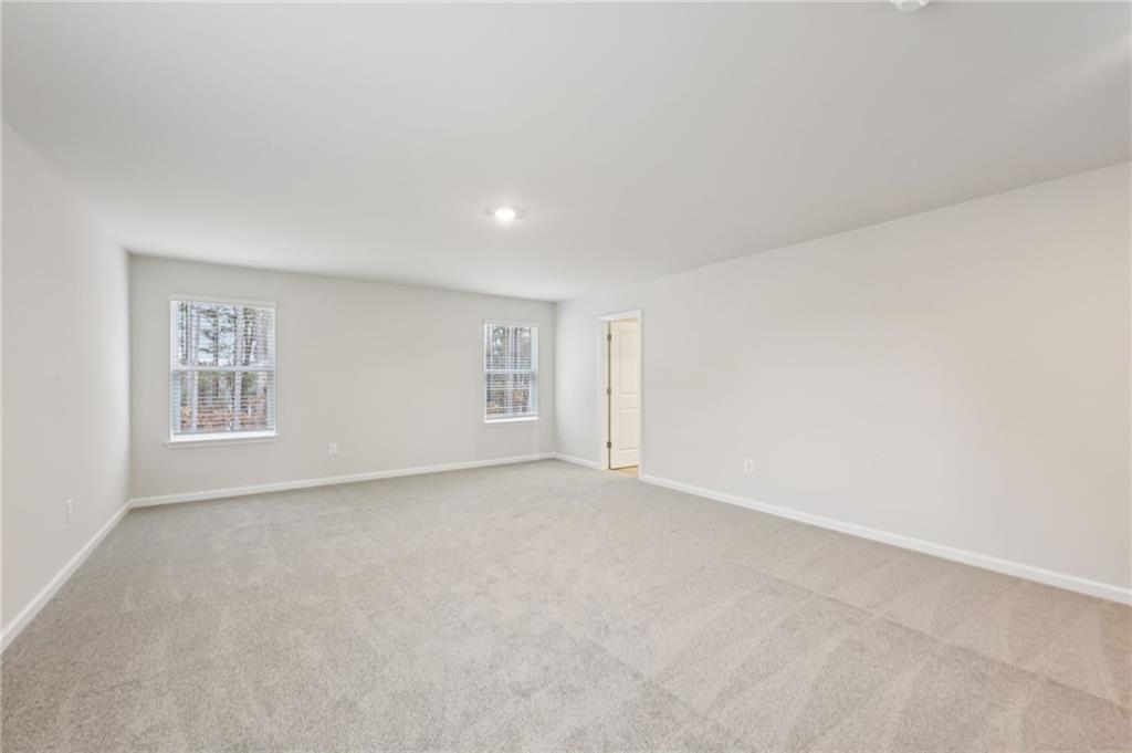 471 Tallulah Lane Grayson, GA 30017 - Photo 22 of 38 a view of an empty room with a window