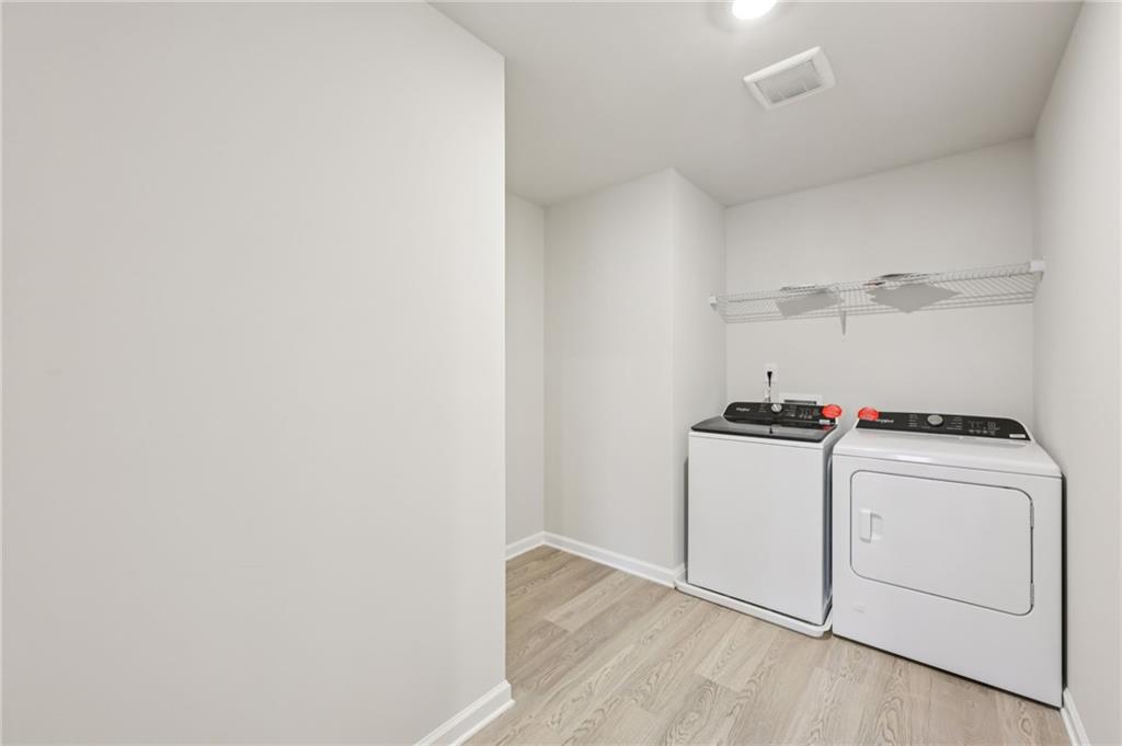 471 Tallulah Lane Grayson, GA 30017 - Photo 27 of 38 a utility room with dryer and washer