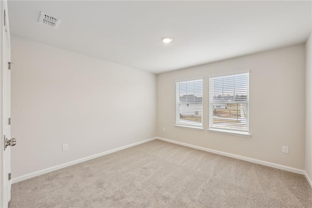471 Tallulah Lane Grayson, GA 30017 - Photo 33 of 38 an empty room with a window