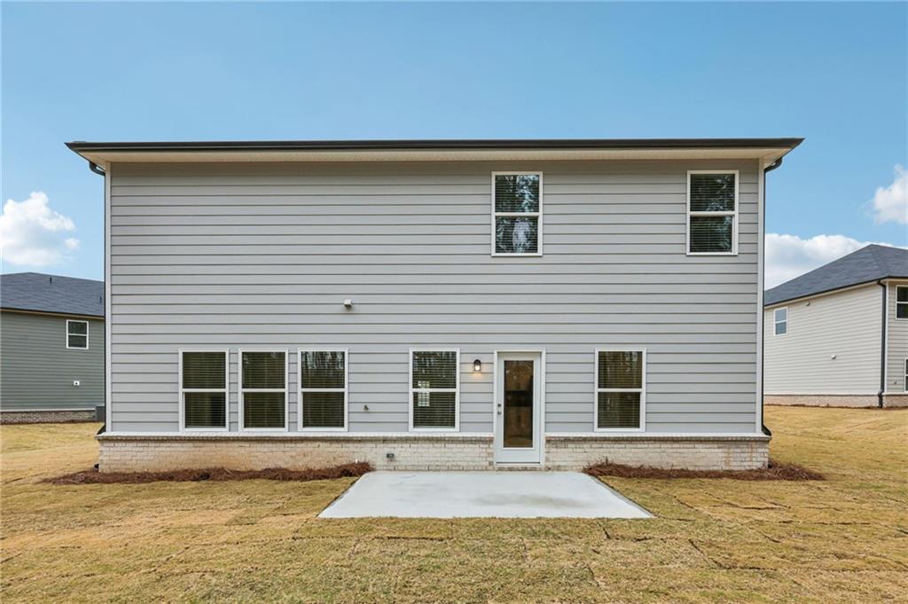 471 Tallulah Lane Grayson, GA 30017 - Photo 37 of 38 a front view of a house with a yard