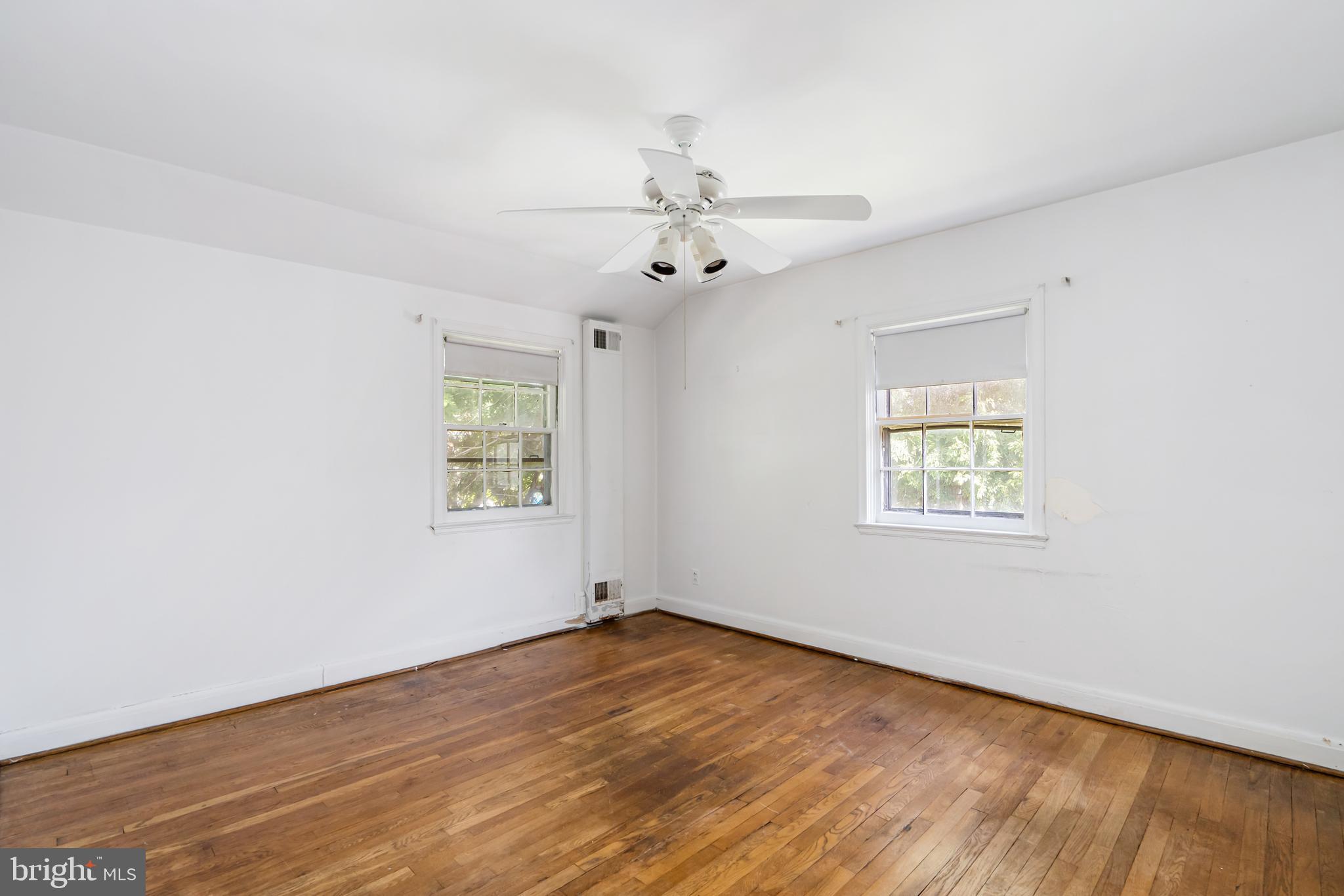 4009 Brookhill Road Baltimore, MD 21215 - Photo 16 of 27 Additional Bedroom with Natural Light Shining In